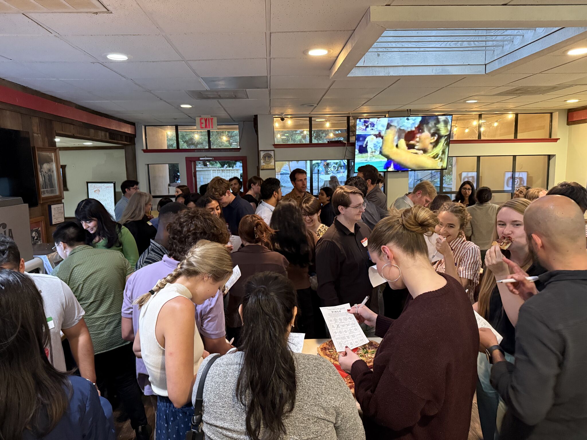 Attendees mingling at a networking event.