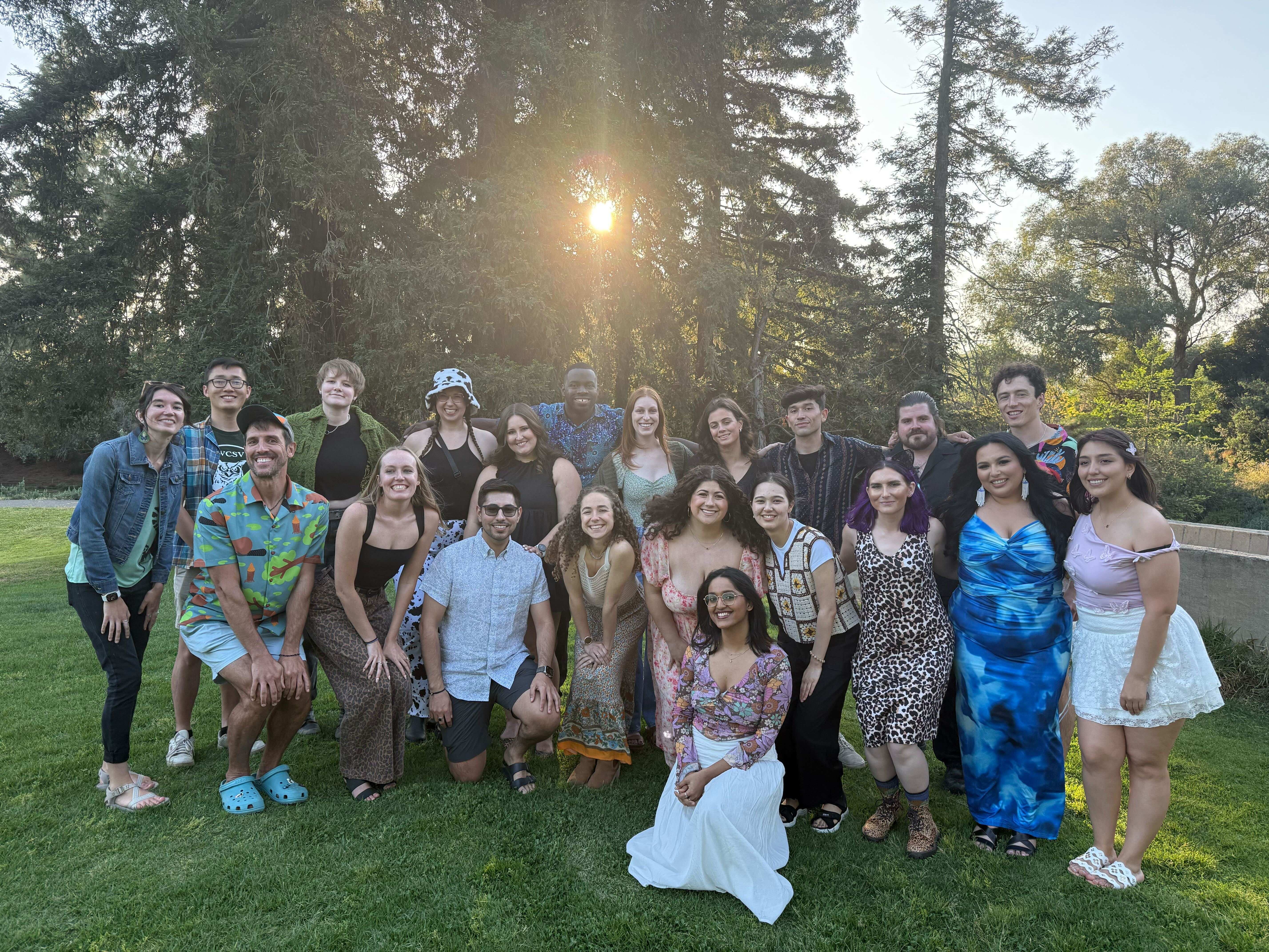 EPM First Year Cohort standing in front of trees at the Putah Creek Lodge