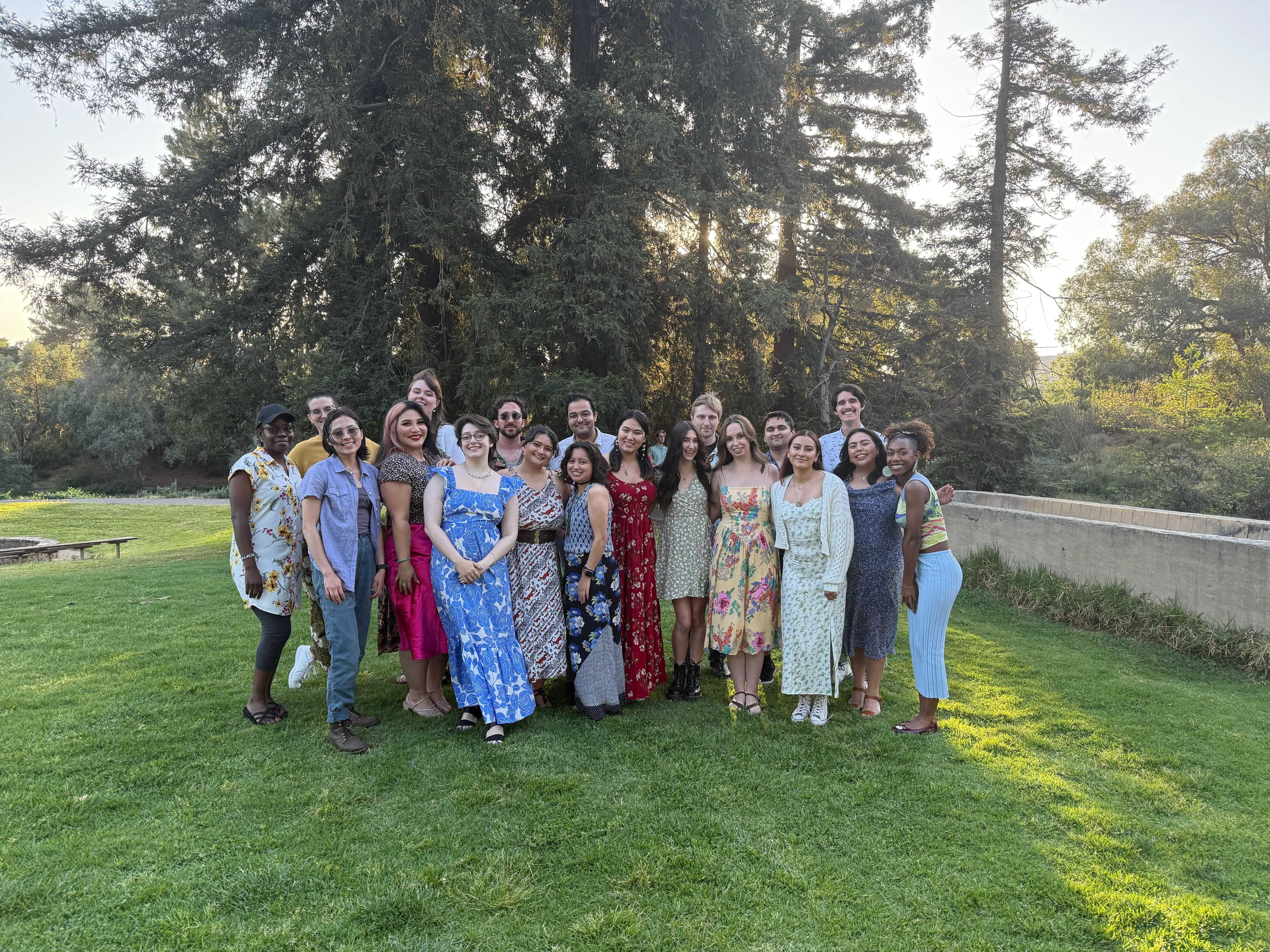 EPM First Year Cohort standing in front of trees at the Putah Creek Lodge