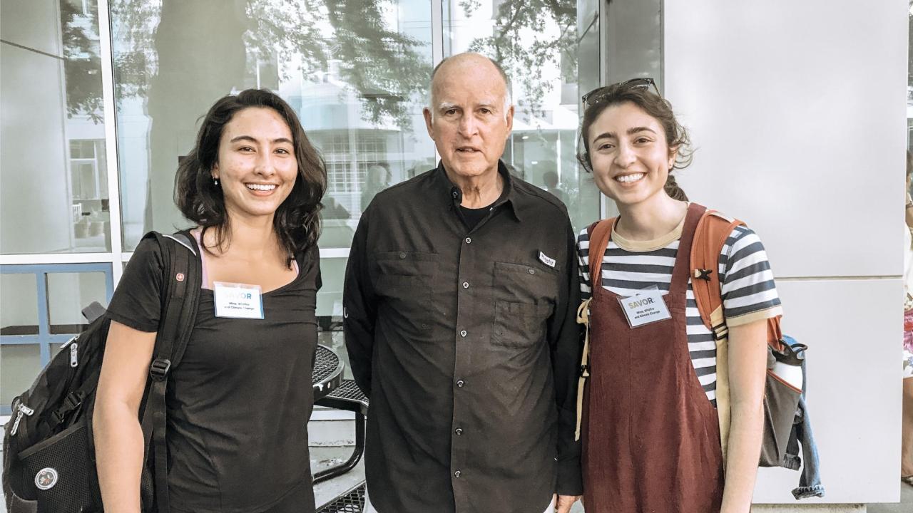 Environmental Policy & Management students Amanda DeMarco and Emily Zakowski featured with former Governor of California, Jerry Brown
