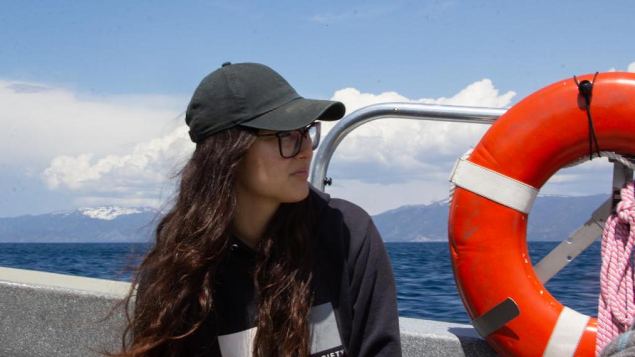 Kamryn Kubose on a boat at Lake Tahoe.