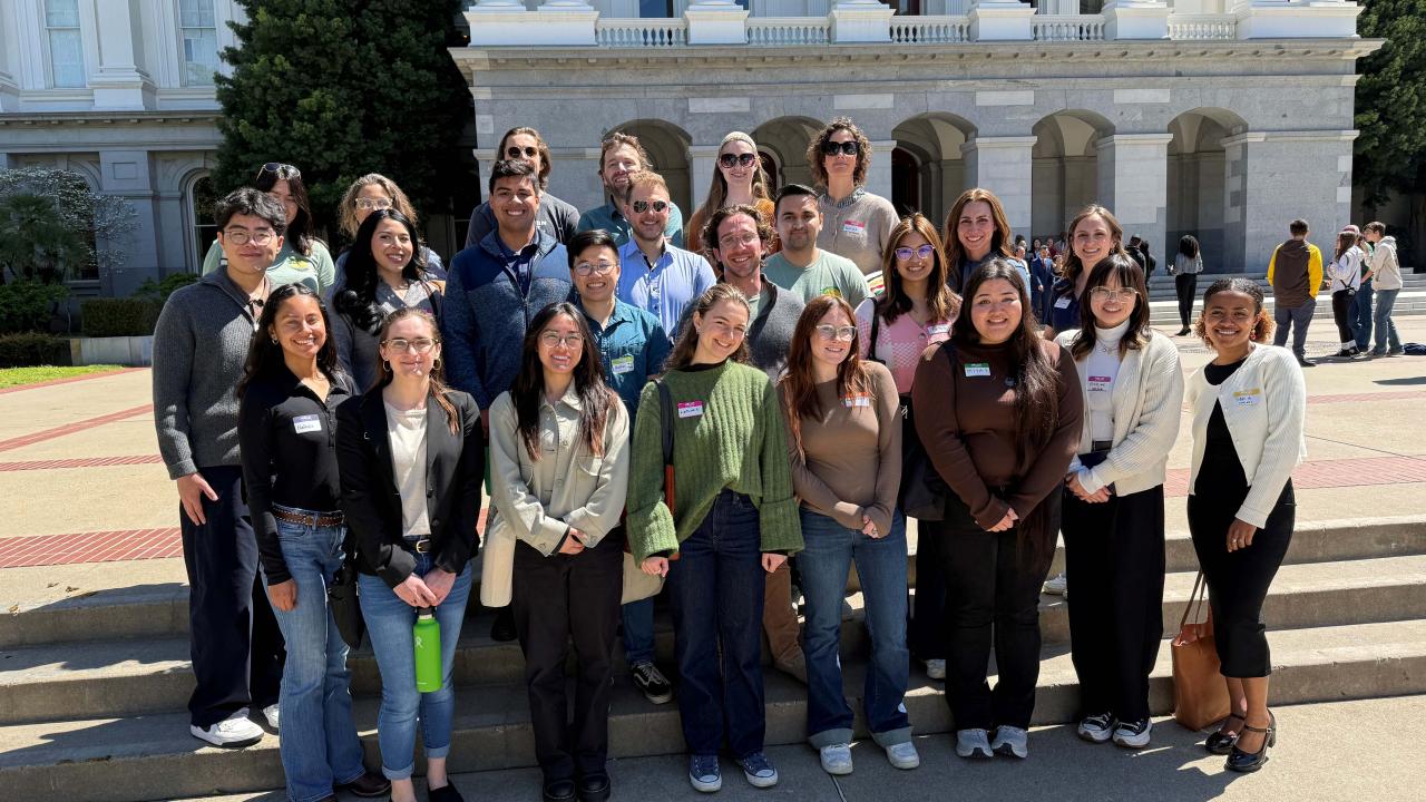 A group of students featured in front of the California State Capitol Building