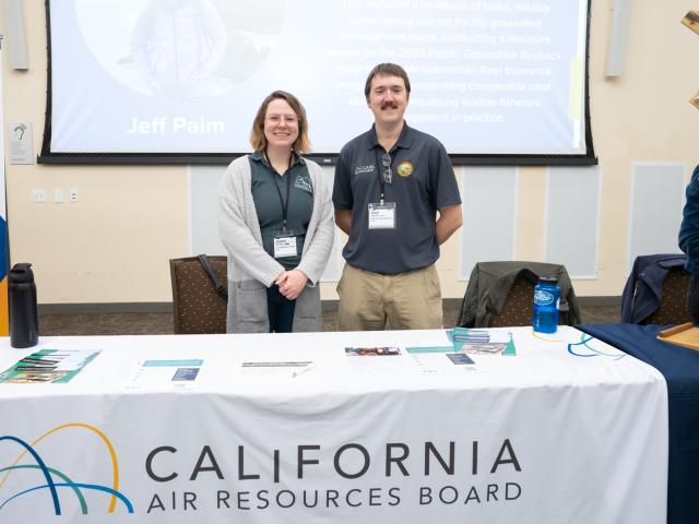 EPm alums Cheryl and Nick representing their organization at EPM's Job Fair