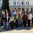 A group of students featured in front of the California State Capitol Building